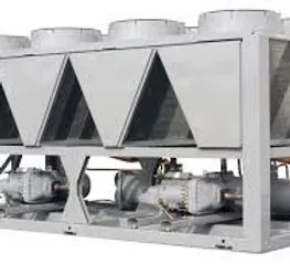 Air-cooled chiller, its condenser fan sections angled in a row above the compressors along the base of the frame